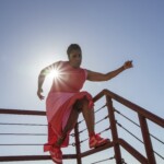 Laura Elaine Ellis dancing on a fire escape.