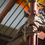 Jhia Jackson dancing on a fire escape.