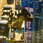 Jhia Jackson dancing on the side of the Cadillac Hotel