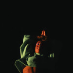 Saharla Vetsch Dancing on a roof top.