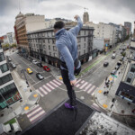 B Dean dancing on a rooftop during rehearsal.