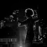 Saharla Vetsch dancing on a rooftop during rehearsal.